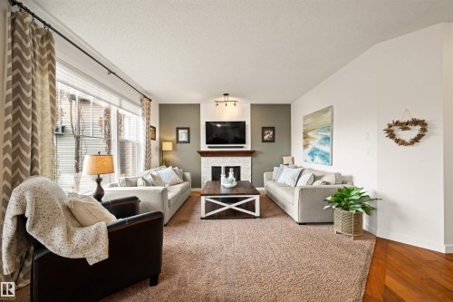 20722 56A Avenue, Edmonton, AB - Indoor Photo Showing Living Room With Fireplace