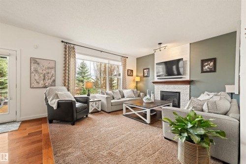 20722 56A Avenue, Edmonton, AB - Indoor Photo Showing Living Room With Fireplace