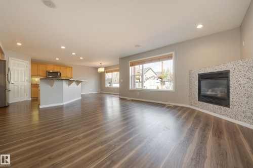 3005 Spence Wynd, Edmonton, AB - Indoor Photo Showing Living Room With Fireplace