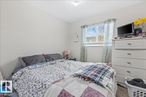 #106B 114 Westpark Dr, Fort Saskatchewan, AB - Indoor Photo Showing Bedroom