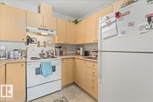 #106B 114 Westpark Dr, Fort Saskatchewan, AB - Indoor Photo Showing Kitchen
