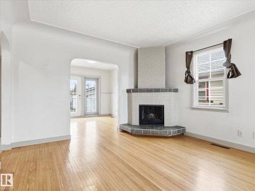 12324 104 Street, Edmonton, AB - Indoor Photo Showing Living Room With Fireplace