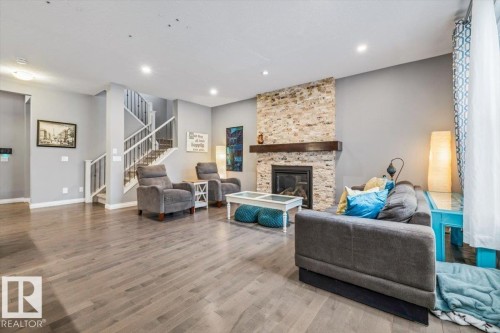 22933 94A Avenue, Edmonton, AB - Indoor Photo Showing Living Room With Fireplace