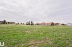 Expansive green space with manicured grass - 