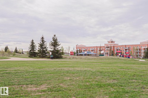 Expansive green space with walking paths and mature evergreen trees - 1627 Melrose Place Sw, Edmonton, AB - Outdoor With View