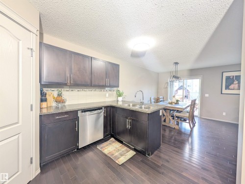 3336 17B Avenue, Edmonton, AB - Indoor Photo Showing Kitchen With Double Sink