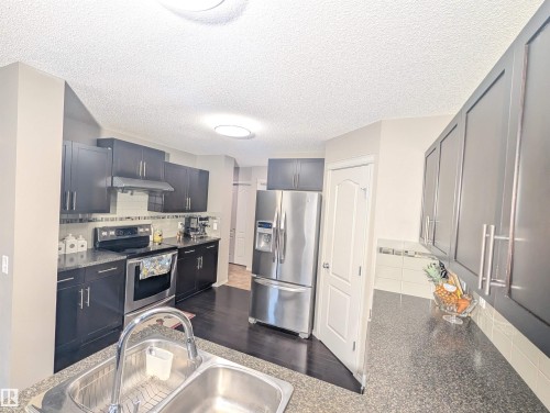 3336 17B Avenue, Edmonton, AB - Indoor Photo Showing Kitchen With Double Sink
