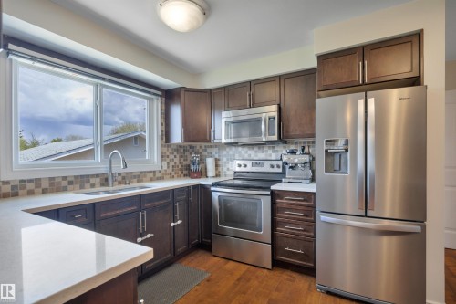 14104 79 Street, Edmonton, AB - Indoor Photo Showing Kitchen With Stainless Steel Kitchen With Double Sink