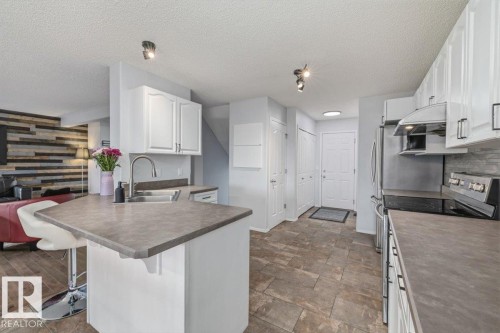 3570 Mclean Crescent, Edmonton, AB - Indoor Photo Showing Kitchen With Double Sink