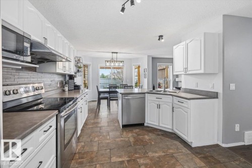 3570 Mclean Crescent, Edmonton, AB - Indoor Photo Showing Kitchen With Double Sink