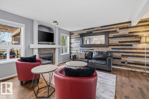 3570 Mclean Crescent, Edmonton, AB - Indoor Photo Showing Living Room With Fireplace