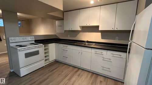 5108 50 Street, Bonnyville Town, AB - Indoor Photo Showing Kitchen With Double Sink