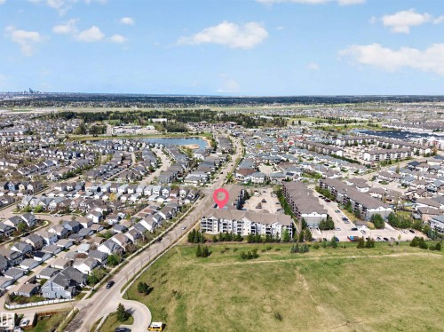 Aerial perspective showcasing a residential development with multiple multi-story buildings - 215 6084 Stanton Drive, Edmonton, AB - Outdoor With View