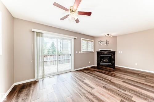 16737 60St, Edmonton, AB - Indoor Photo Showing Other Room With Fireplace