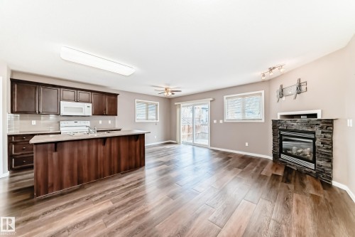 16737 60St, Edmonton, AB - Indoor Photo Showing Other Room With Fireplace