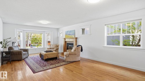 9611 77 Avenue, Edmonton, AB - Indoor Photo Showing Living Room With Fireplace