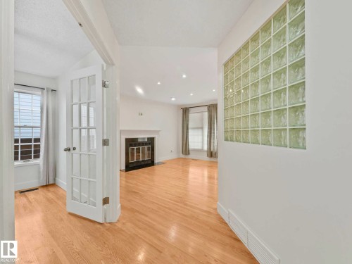 9642 100 Street, Edmonton, AB - Indoor Photo Showing Other Room With Fireplace