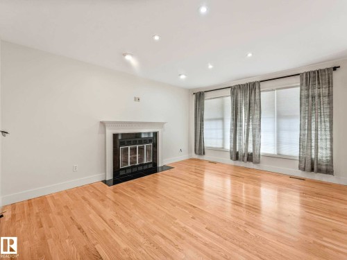 9642 100 Street, Edmonton, AB - Indoor Photo Showing Living Room With Fireplace