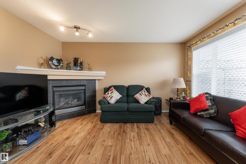 105 Galloway Wynd, Fort Saskatchewan, AB - Indoor Photo Showing Living Room With Fireplace