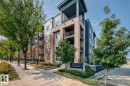 Modern multi-story building featuring a brick and siding exterior with individual balconies - 327 508 Griesbach Parade, Edmonton, AB  - Outdoor 