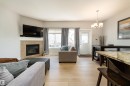 16805 55 Street, Edmonton, AB  - Indoor Photo Showing Living Room With Fireplace 