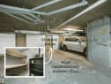 Dedicated underground parking stall featuring concrete flooring and a concrete ceiling with exposed piping - 422 5816 Mullen Place, Edmonton, AB  - Indoor Photo Showing Garage 