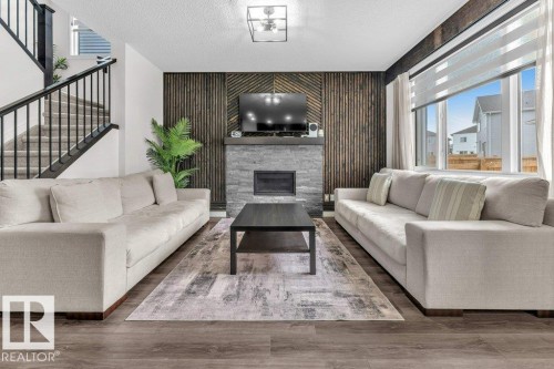 2107 14 Avenue, Edmonton, AB - Indoor Photo Showing Living Room With Fireplace