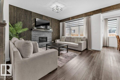 2107 14 Avenue, Edmonton, AB - Indoor Photo Showing Living Room With Fireplace