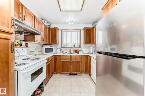 15611 83A Street, Edmonton, AB - Indoor Photo Showing Kitchen With Double Sink