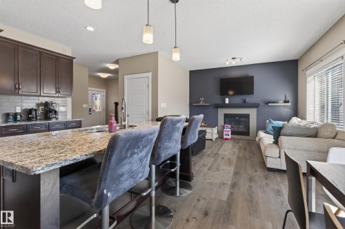 3356 Hilton Crescent, Edmonton, AB - Indoor Photo Showing Living Room With Fireplace