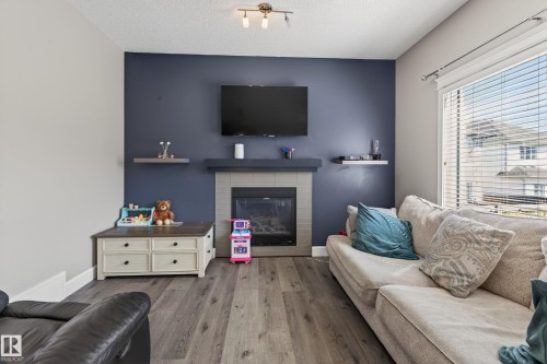 3356 Hilton Crescent, Edmonton, AB - Indoor Photo Showing Living Room With Fireplace