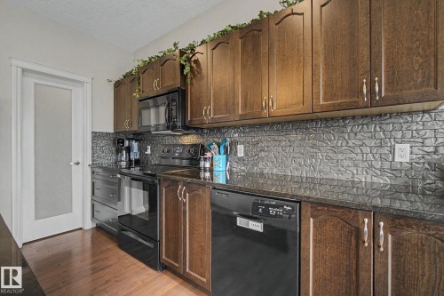 82 Dalquist Bay, Leduc, AB - Indoor Photo Showing Kitchen