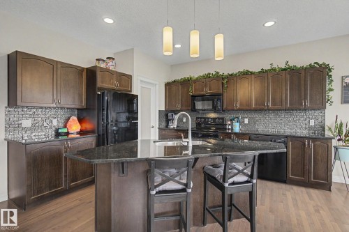 82 Dalquist Bay, Leduc, AB - Indoor Photo Showing Kitchen With Double Sink