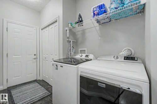 82 Dalquist Bay, Leduc, AB - Indoor Photo Showing Laundry Room