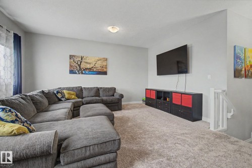 82 Dalquist Bay, Leduc, AB - Indoor Photo Showing Living Room