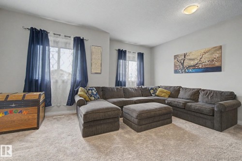 82 Dalquist Bay, Leduc, AB - Indoor Photo Showing Living Room