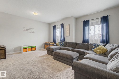 82 Dalquist Bay, Leduc, AB - Indoor Photo Showing Living Room