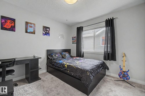 82 Dalquist Bay, Leduc, AB - Indoor Photo Showing Bedroom