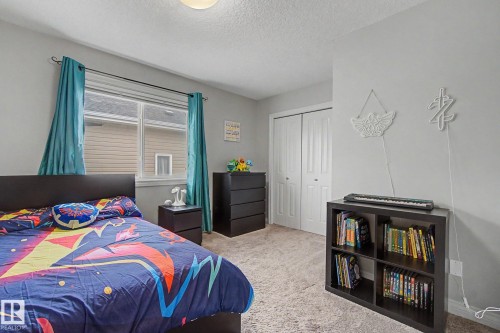 82 Dalquist Bay, Leduc, AB - Indoor Photo Showing Bedroom