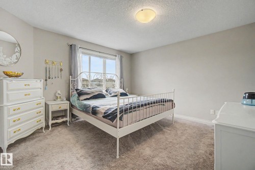 82 Dalquist Bay, Leduc, AB - Indoor Photo Showing Bedroom