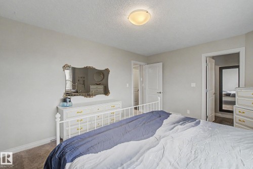 82 Dalquist Bay, Leduc, AB - Indoor Photo Showing Bedroom