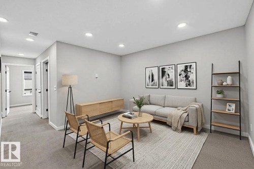 Spacious room with recessed lighting and neutral wall tones - 332 Juniper Cove, Leduc, AB - Indoor