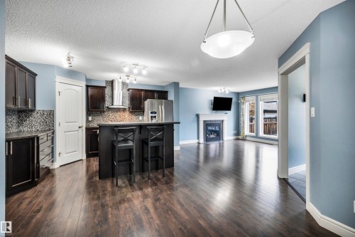 2429 Austin Crescent, Edmonton, AB - Indoor Photo Showing Kitchen With Fireplace