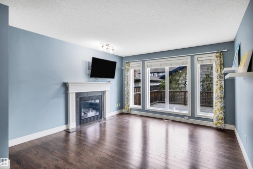 2429 Austin Crescent, Edmonton, AB - Indoor Photo Showing Living Room With Fireplace