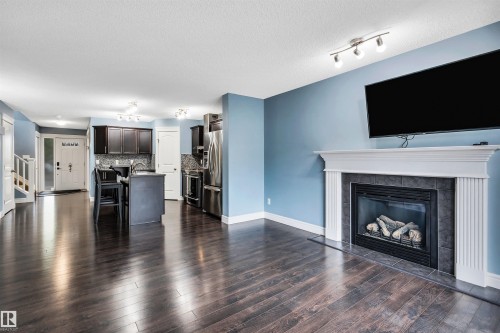 2429 Austin Crescent, Edmonton, AB - Indoor Photo Showing Living Room With Fireplace