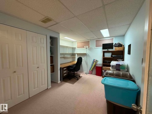 Finished basement room featuring light blue walls and neutral carpeting - 2812 35 Street, Edmonton, AB - Indoor