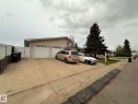 Two-car attached garage with individual white doors - 2812 35 Street, Edmonton, AB  - Outdoor 