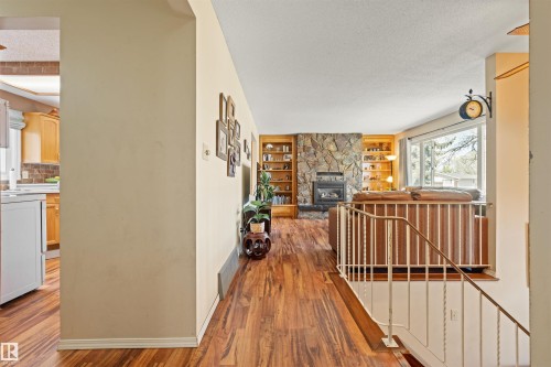 4012 86 Street, Edmonton, AB - Indoor Photo Showing Other Room With Fireplace