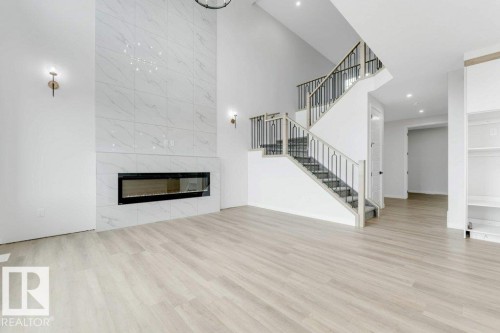 1847 Crossbill Loop, Edmonton, AB - Indoor Photo Showing Living Room With Fireplace