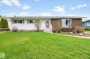 Ranch-style exterior with a split facade featuring white siding and brickwork - 4611 Lakeshore Drive, Bonnyville Town, AB  - Outdoor 